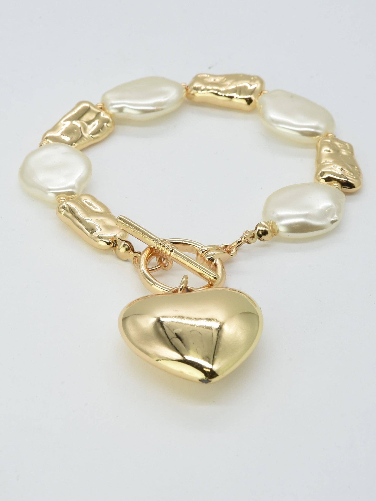 Flat Oval Pearl and Textured Gold Toggle Bracelet with Puffy Heart Charm